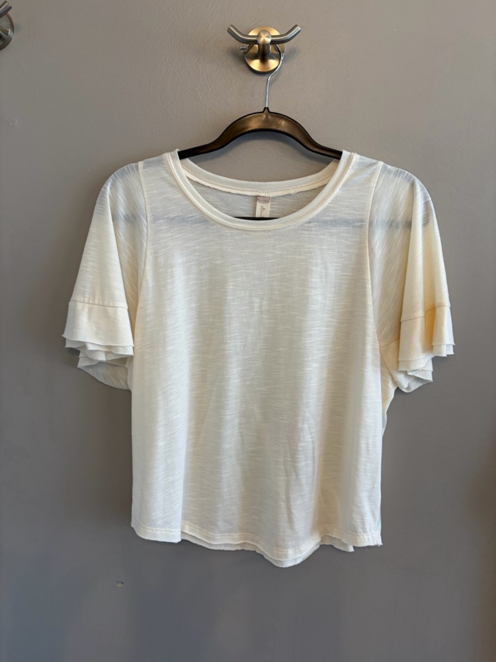 Altar’d State cream flowy ruffle short sleeved tee size M sheer